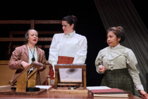 Lizzi Albert as Henrietta Leavitt, Martina Schabron as Williamina Fleming, and Rocelyn Frisco as Annie Cannon