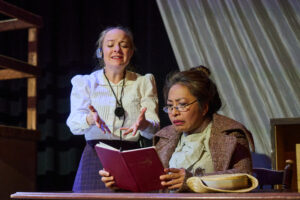 Lizzi Albert as Henrietta Leavitt and Rocelyn Frisco as Annie Cannon