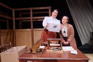 Martina Schabron as Williamina Fleming and Lizzi Albert as Henrietta Leavitt